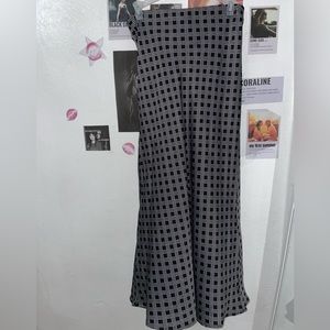 Black skirt with gray lines .・✫・゜